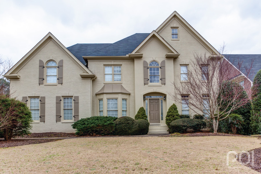 This formerly red brick home is now a painted brick home.