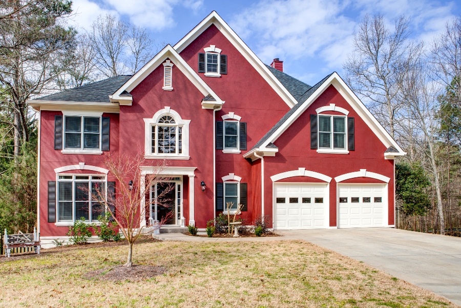 stucco home painted red